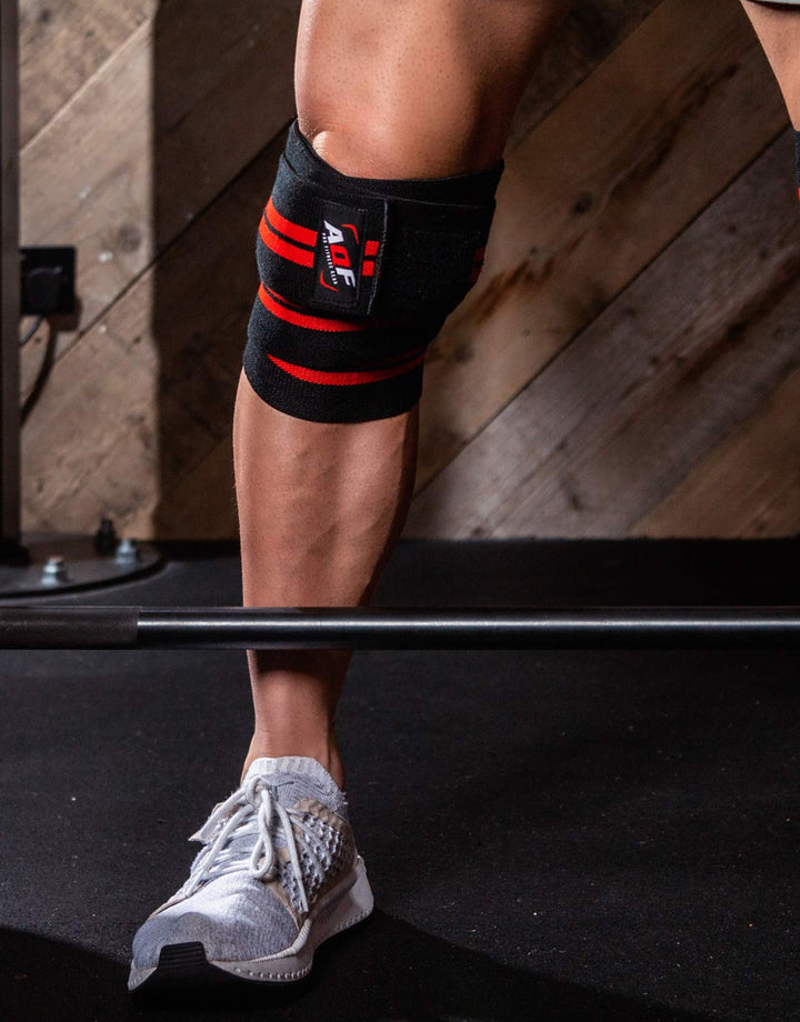 Man wearing AQF black and red striped knee Wrap